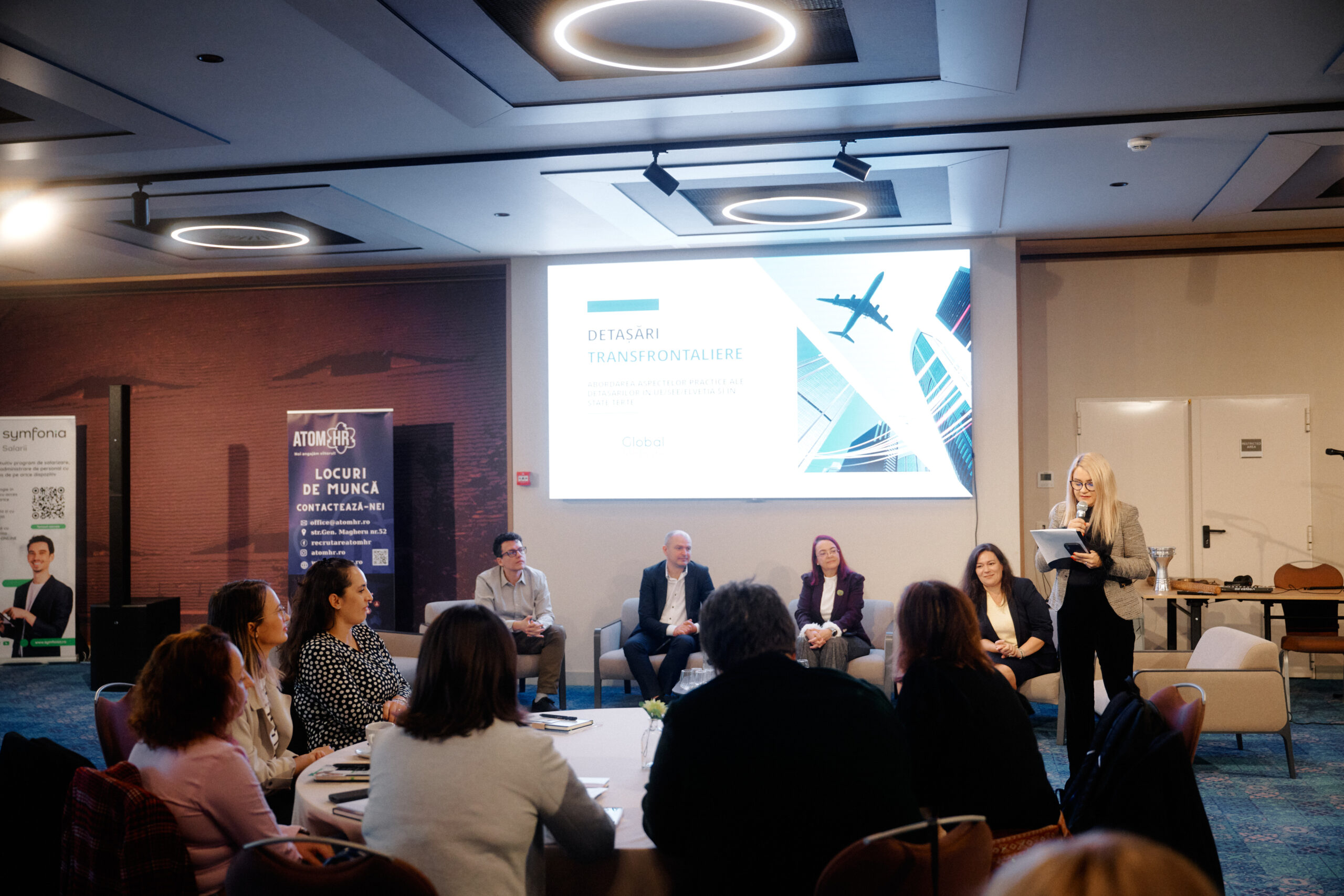 Attendees at the International Mobility conference in Sibiu during the presentation on employee mobility and EU posting rules.