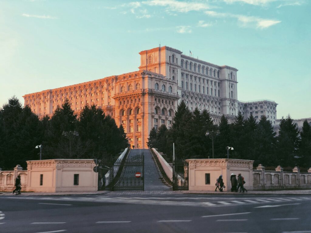 Foreign entrepreneurs discussing business establishment and residence options in Romania